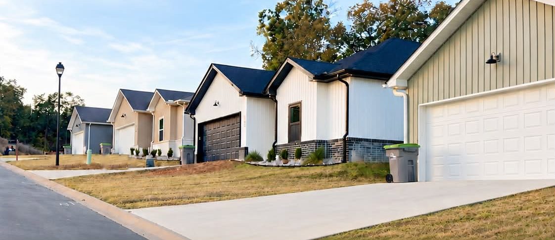 A row of new homes along a street in Mountain Falls Estates